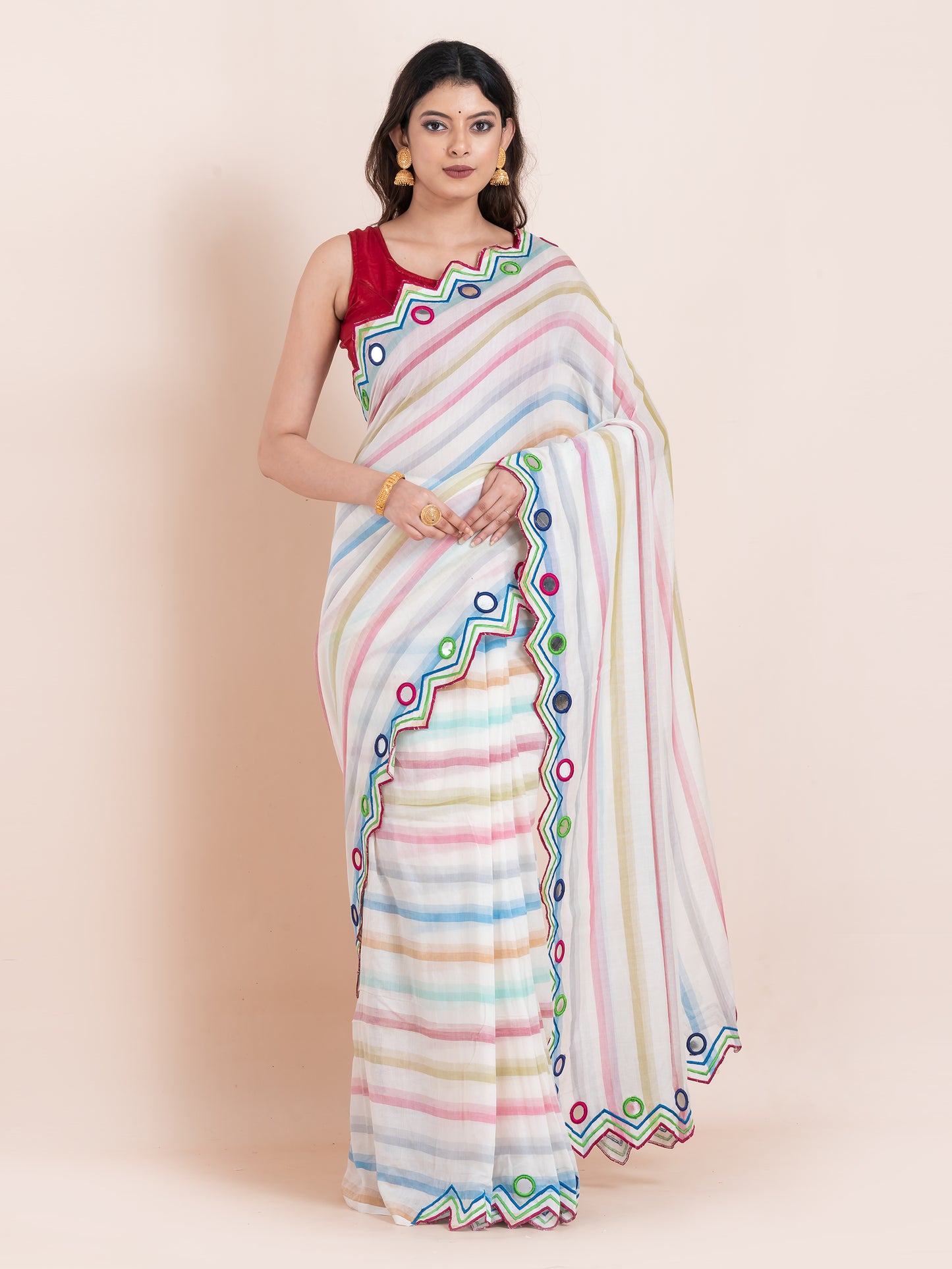 Lightweight white mulmul cotton saree with mirror embroidery and multicolored stripes. Perfect for summer wear, festive looks, and effortless elegance.