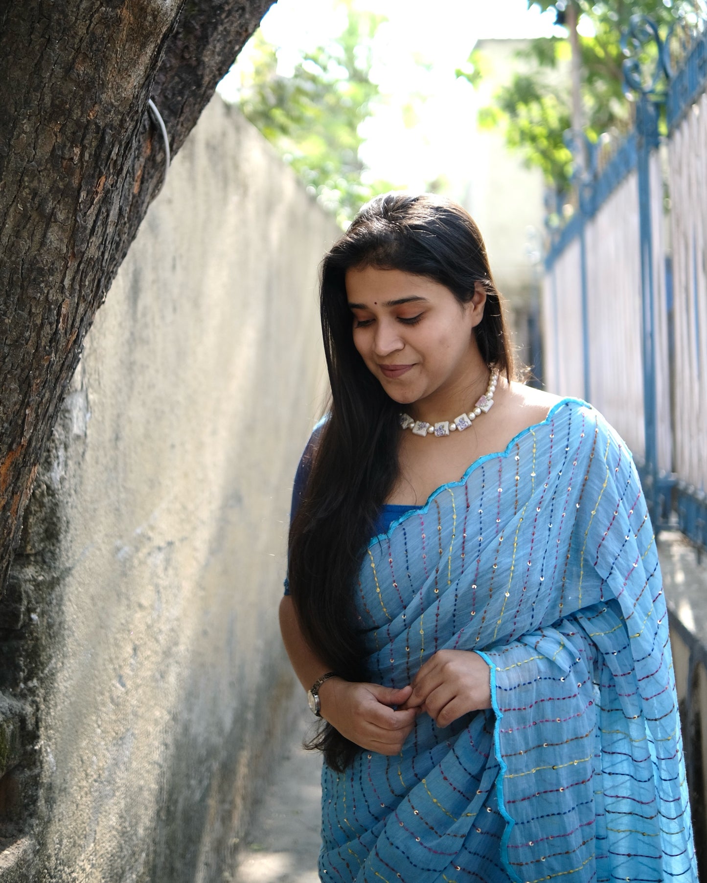 Soft and comfortable mulmul cotton saree with multicoloured embroidery in Kantha Stitch embellished with sequins perfect for party or festive occasion in sky blue