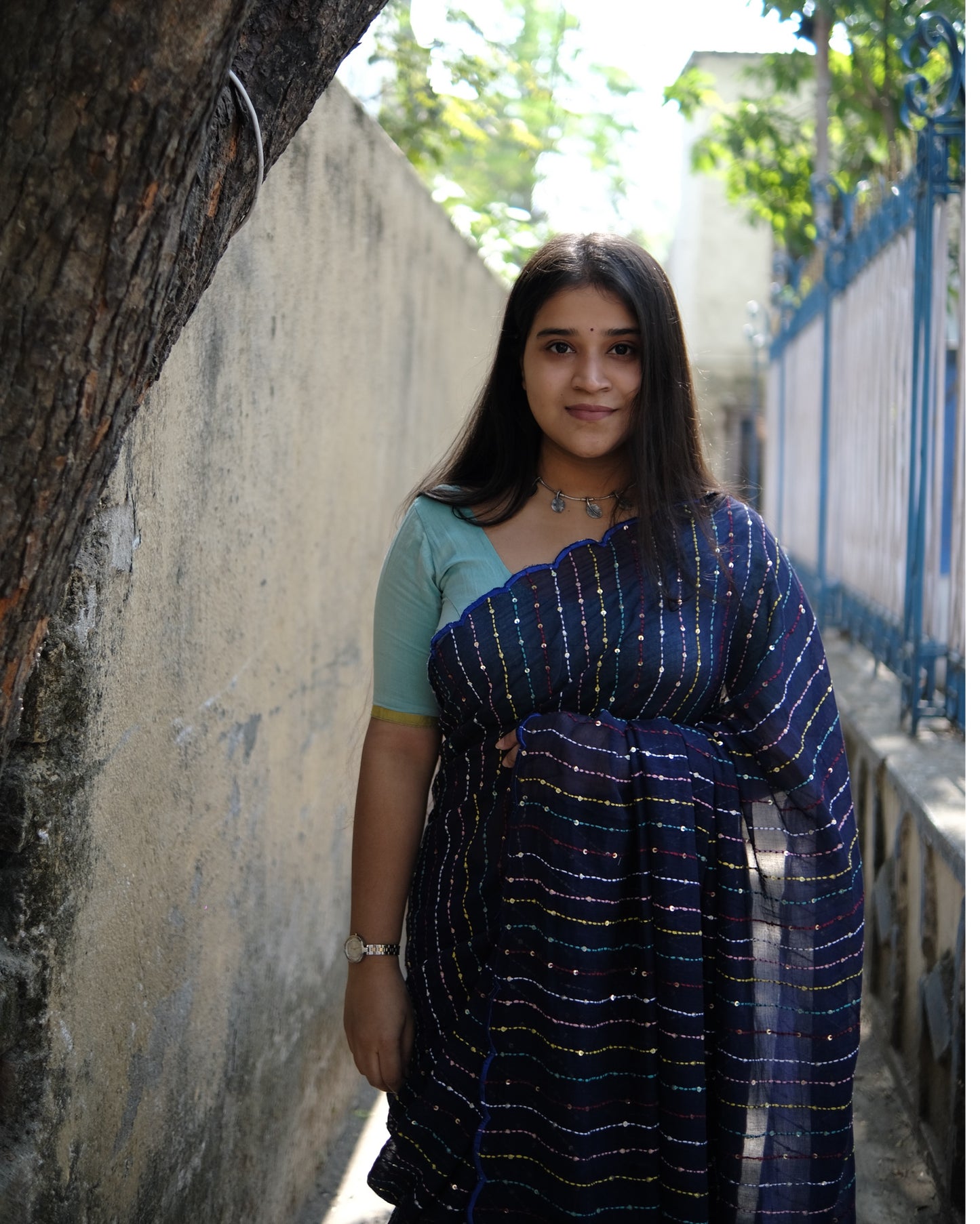 Soft and comfortable mulmul cotton saree with multicoloured embroidery in Kantha Stitch embellished with sequins perfect for party or festive occasion in navy blue