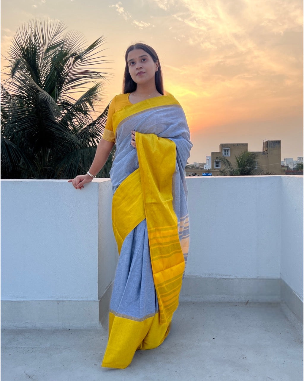 Grey handloom cotton saree with golden satin border