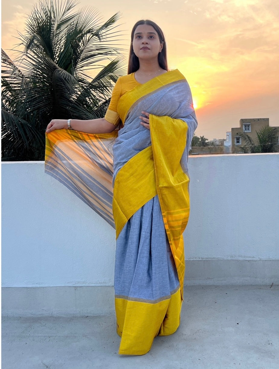 Grey handloom cotton saree with golden satin border