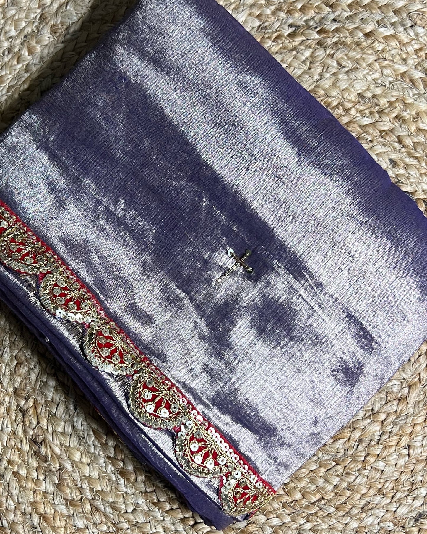 Mulmul Tissue Festive/Party Wear saree for the wedding season in lavender / purple / violet colour with red Sari border and Zardozi/Jarsousi work on entire saree, metallic finish