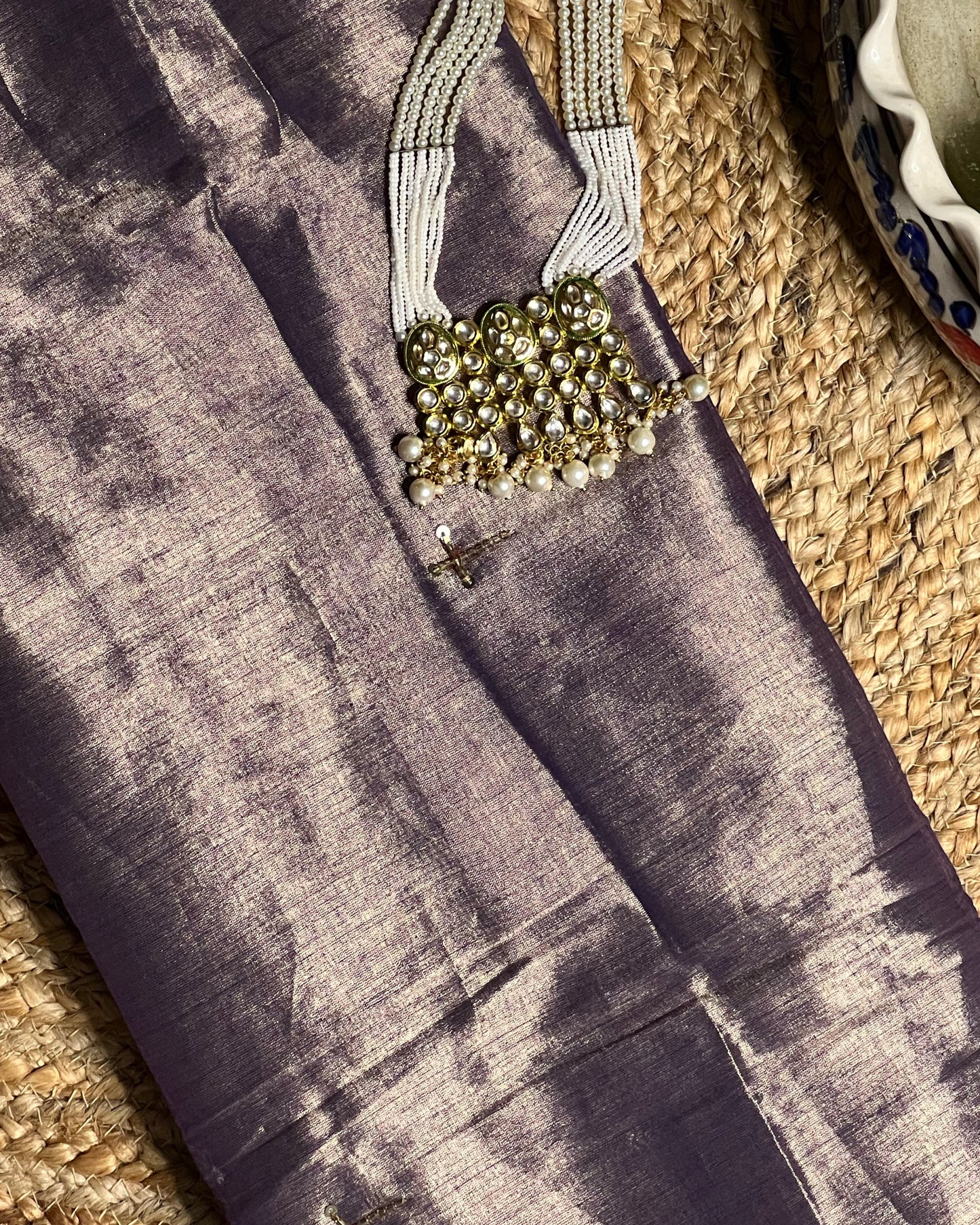 Mulmul Tissue Festive/Party Wear saree for the wedding season in lavender / purple / violet colour with red Sari border and Zardozi/Jarsousi work on entire saree, metallic finish