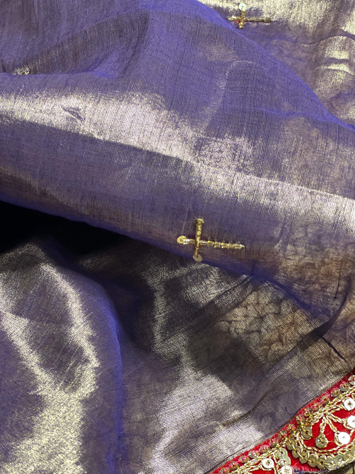 Mulmul Tissue Festive/Party Wear saree for the wedding season in lavender / purple / violet colour with red Sari border and Zardozi/Jarsousi work on entire saree, metallic finish