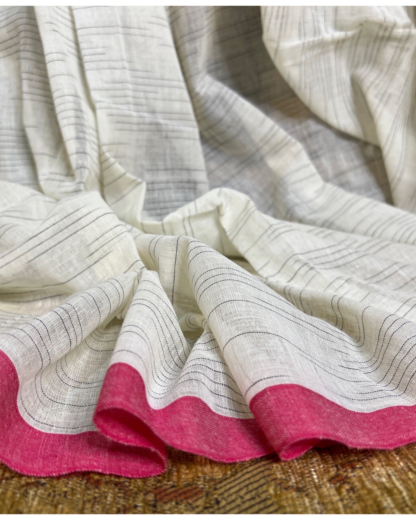 Soft and comfortable white and pink cotton saree for summer - Golaap Paare