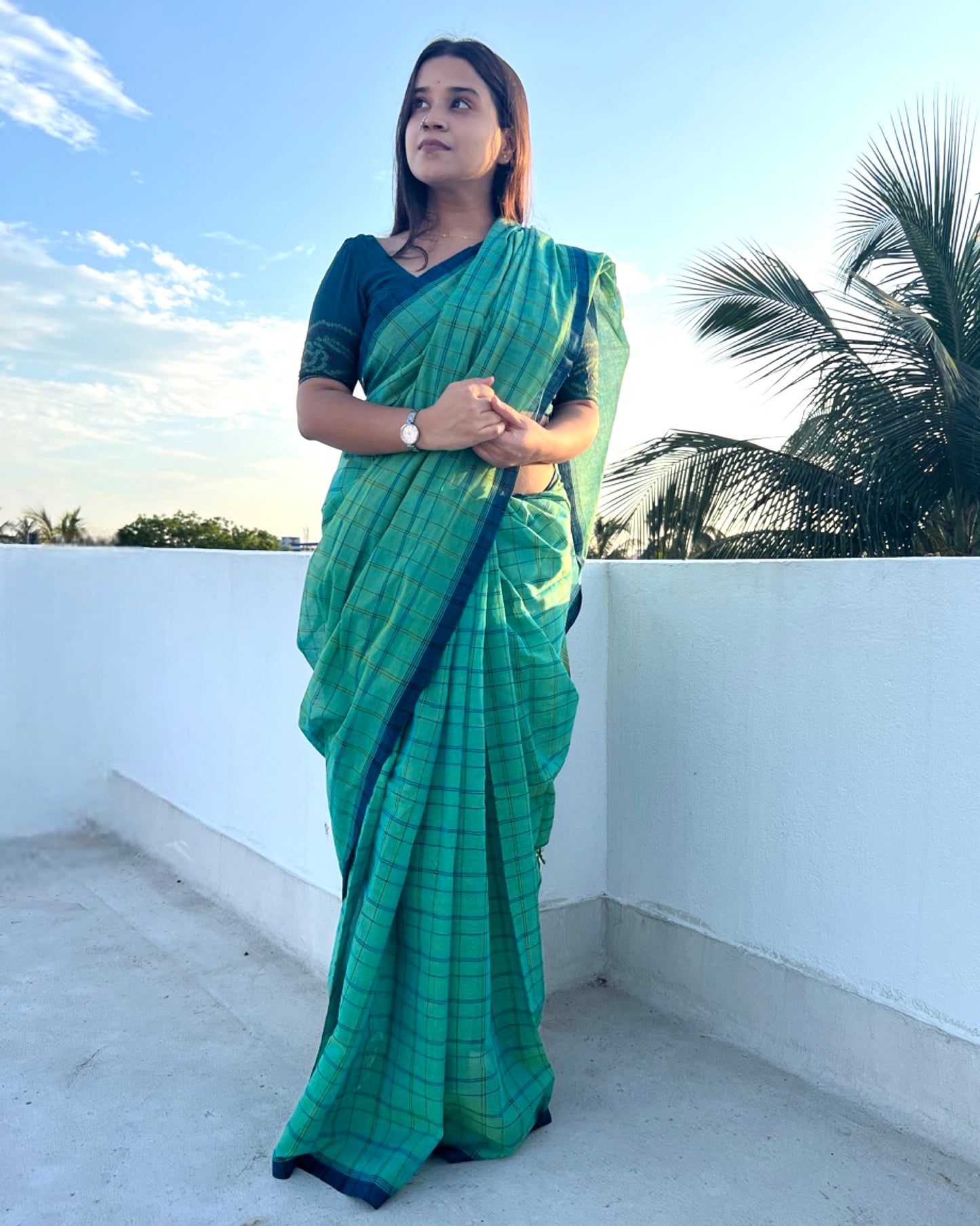 Soft and comfortable cotton handloom saree in Green and blue with Dhaniakhali Aanchal and checks