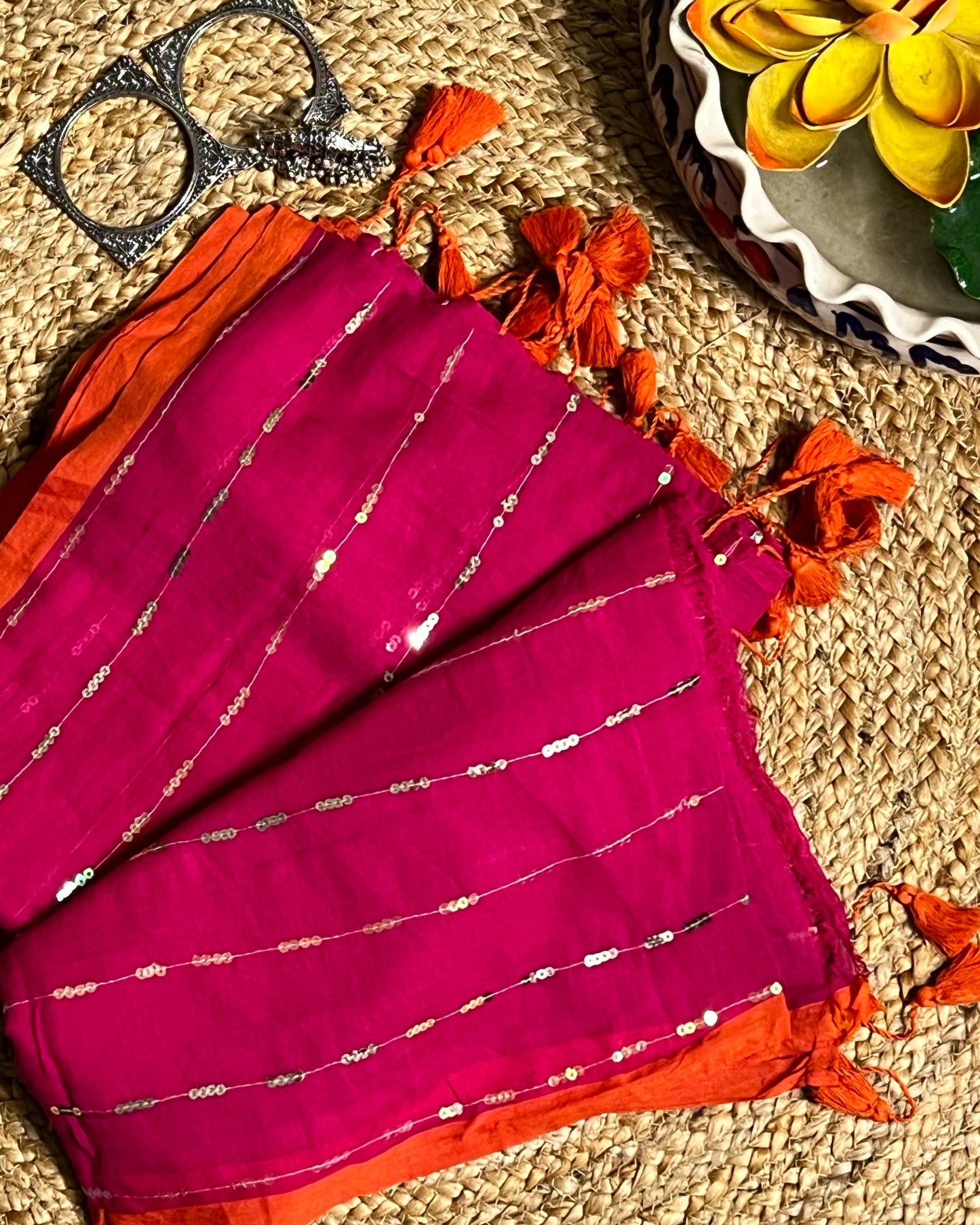 Soft and Comfortable mulmul cotton saree in pink rani shade with sequin emblishment for festive or party wear at reasonable price