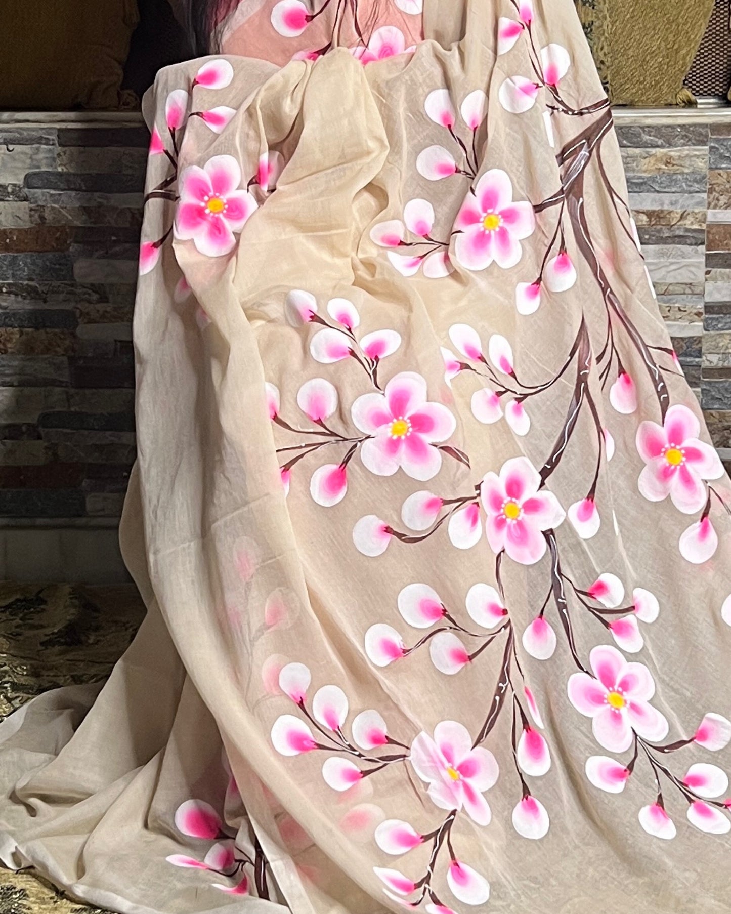 Soft and comfortable light weight white taupe mulmul cotton saree with floral hand painting good for day time wear