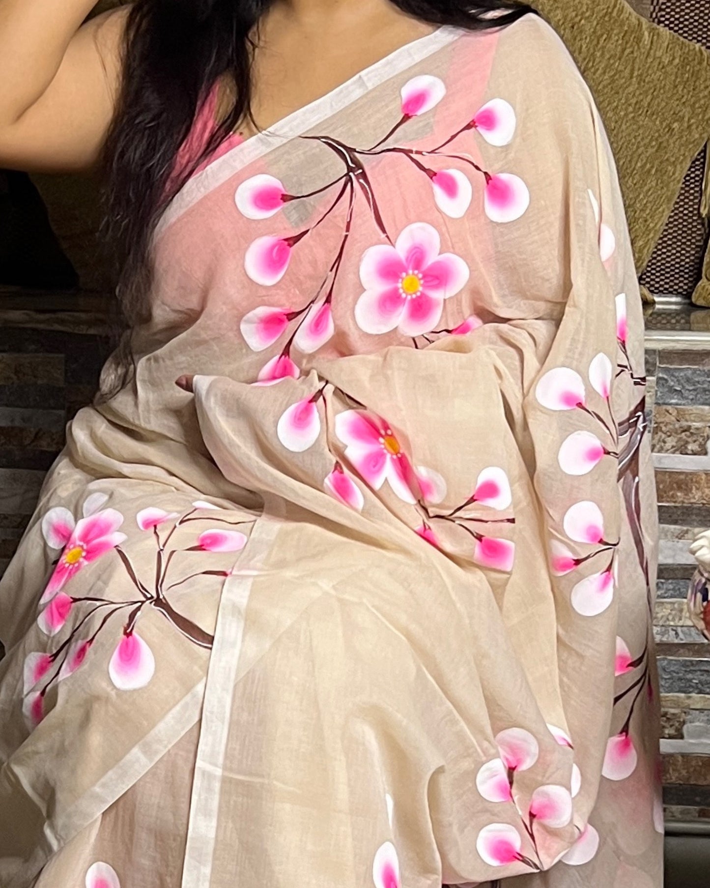 Soft and comfortable light weight white taupe mulmul cotton saree with floral hand painting good for day time wear
