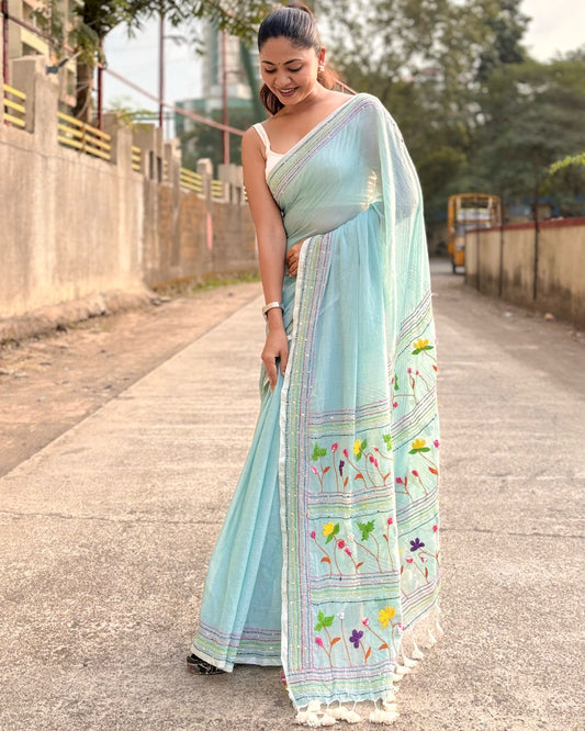 Meadow Mist Muse cyan embroidered mulmul saree with delicate handcrafted thread embroidery