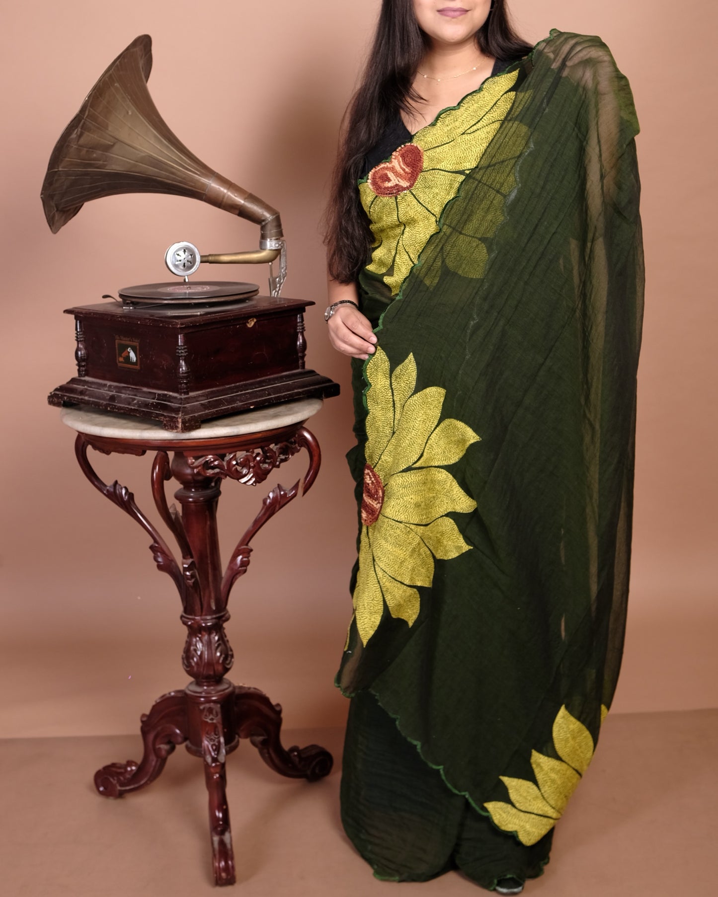 Soft and comfortable light weight green mulmul cotton saree with sunflower embroidery sequins embellished good for day time wear festive party wear