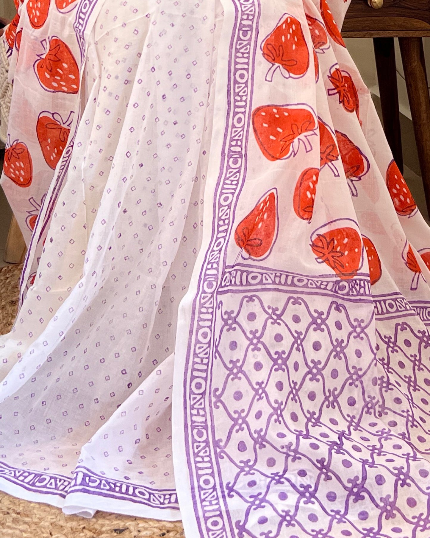 Soft & Comfortable white mulmul saree with handblock print in orange puple strawberry pattern
