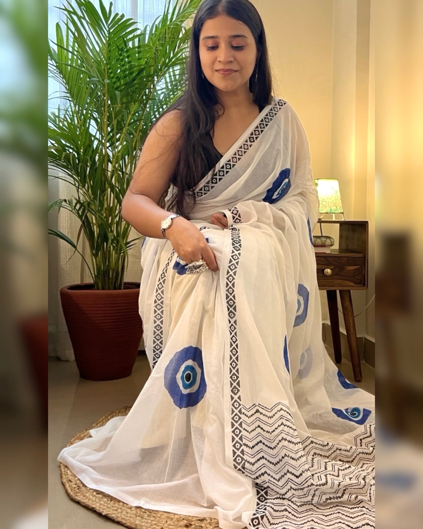 Soft & Comfortable white mulmul saree with handblock print in blue evil eye pattern