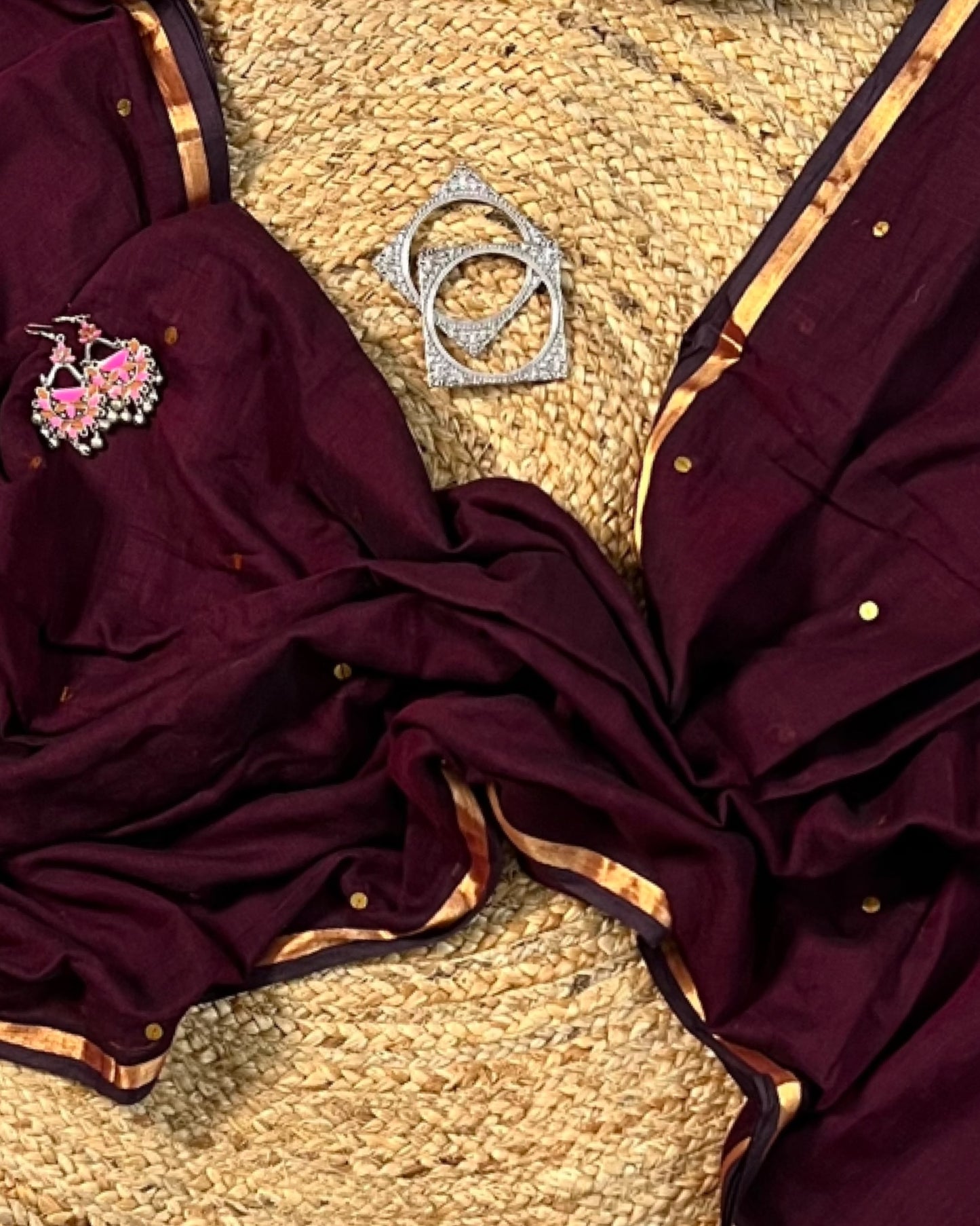 Soft and Comfortable mulmul cotton saree in powder magenta maroon with golden sequin emblishment for festive or party wear at reasonable price
