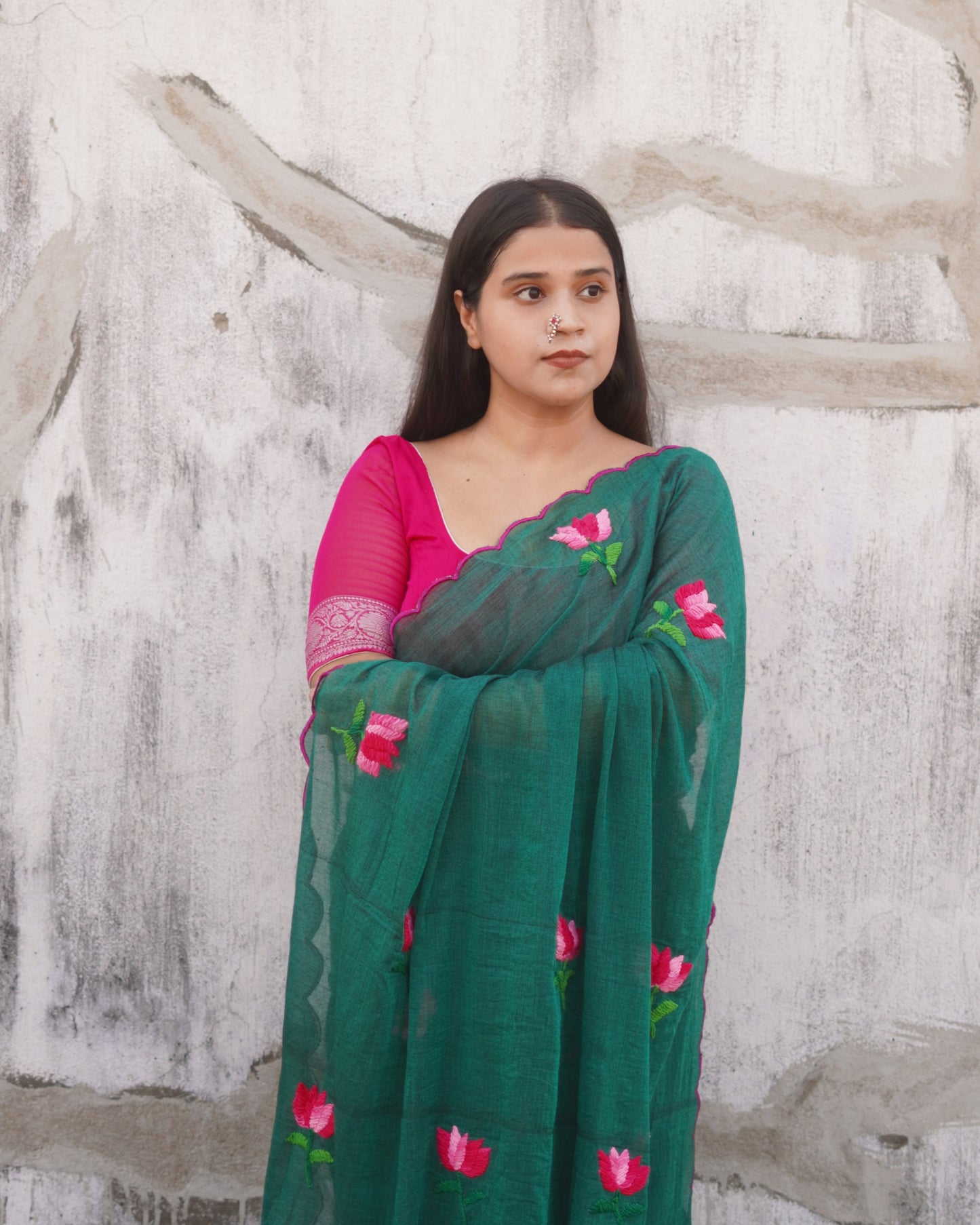 Soft and comfortable light weight emerald dark green mulmul cotton saree with lotus hand embroidery good for day time wear