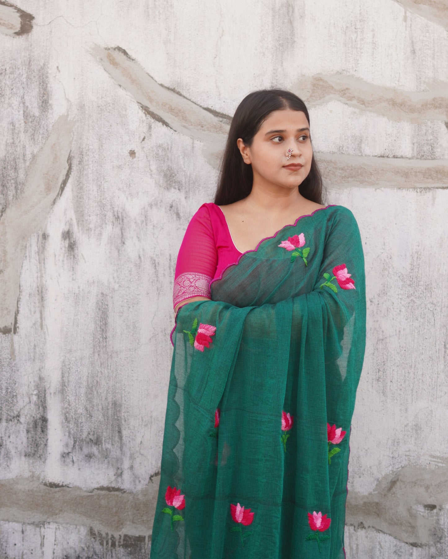 Soft and comfortable light weight emerald dark green mulmul cotton saree with lotus hand embroidery good for day time wear