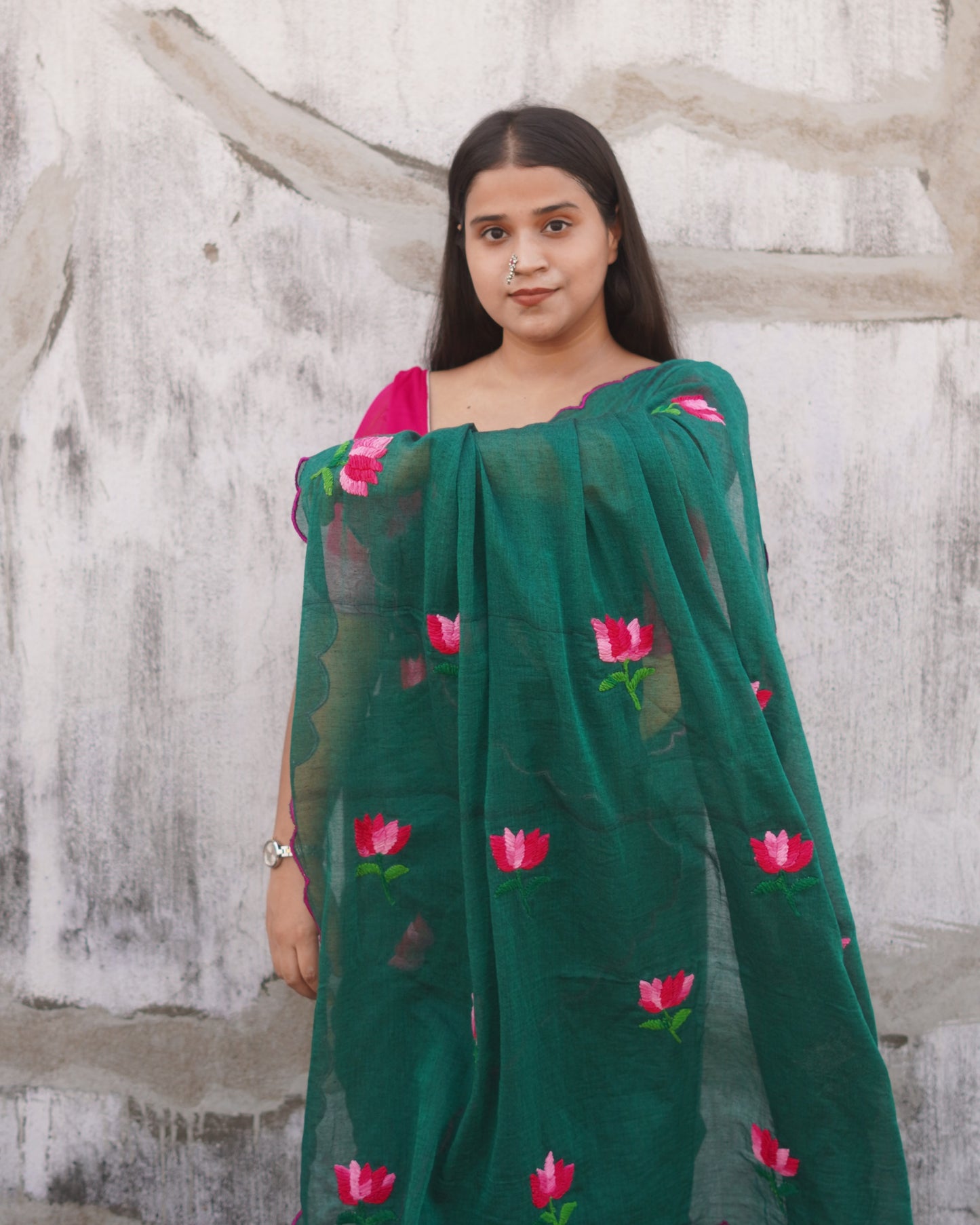 Soft and comfortable light weight emerald dark green mulmul cotton saree with lotus hand embroidery good for day time wear