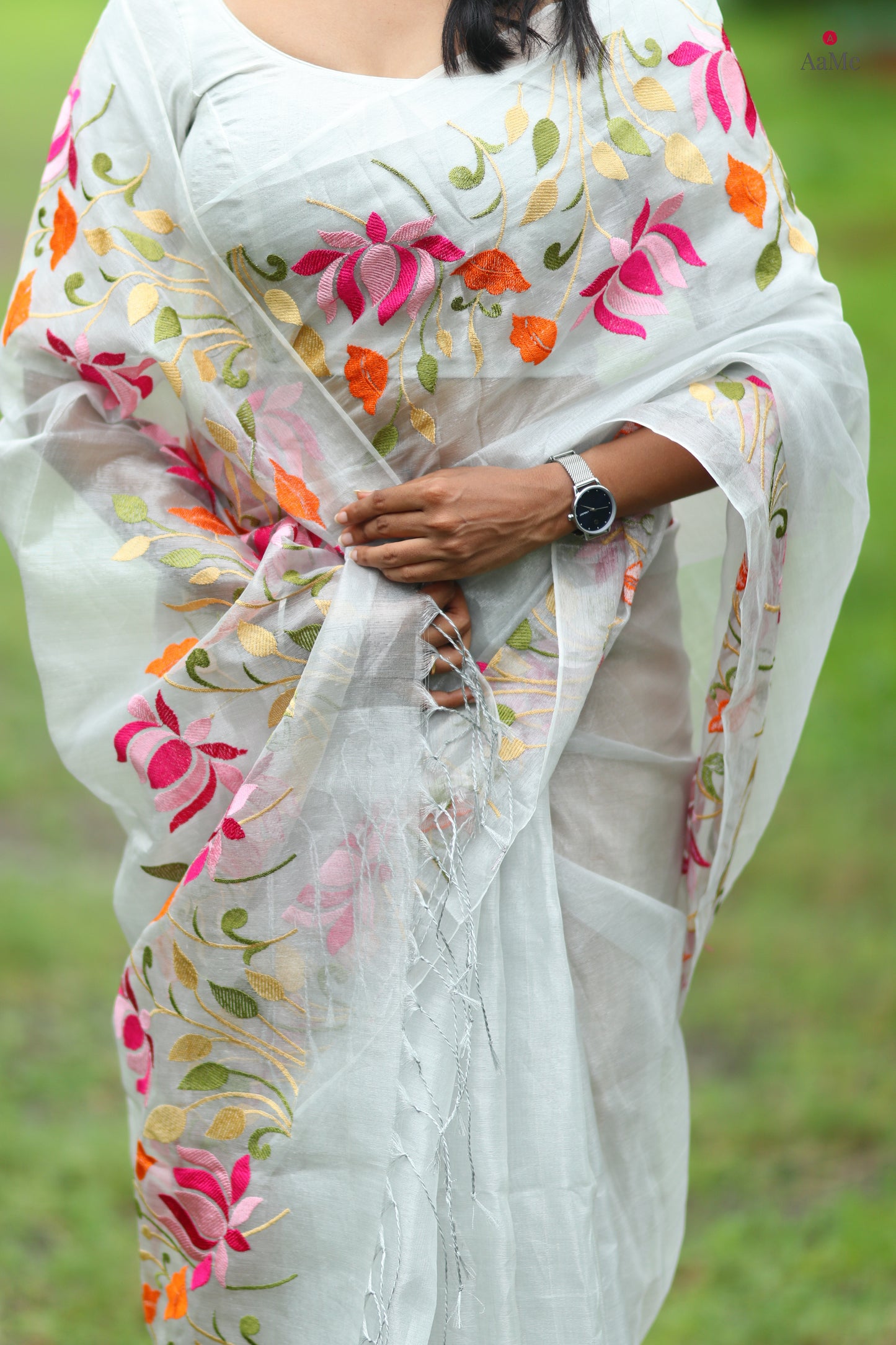 Silver white viral tissue saree with floral embroidery orange and pink