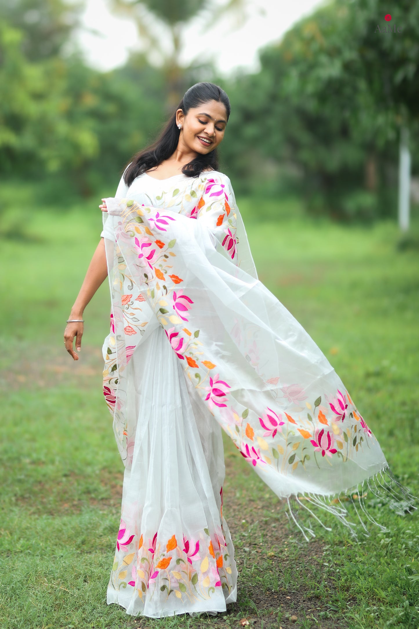Silver white viral tissue saree with floral embroidery orange and pink