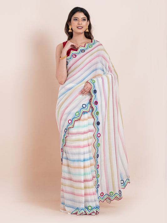 Lightweight white mulmul cotton saree with mirror embroidery and multicolored stripes. Perfect for summer wear, festive looks, and effortless elegance.