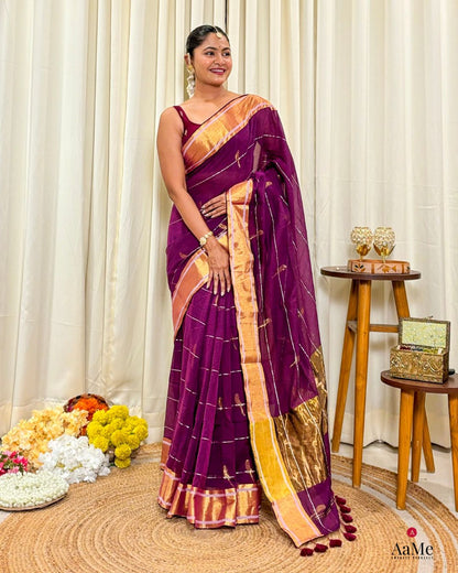 Women wearing lightweight purple mulmul cotton saree designed for comfort during celebrations