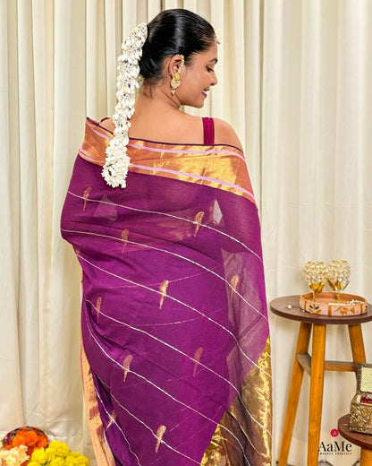 Women wearing lightweight purple mulmul cotton saree designed for comfort during festive gatherings