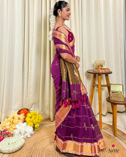 Women wearing elegant purple mulmul cotton saree with handcrafted finish from ShopAaMe for traditional festive functions