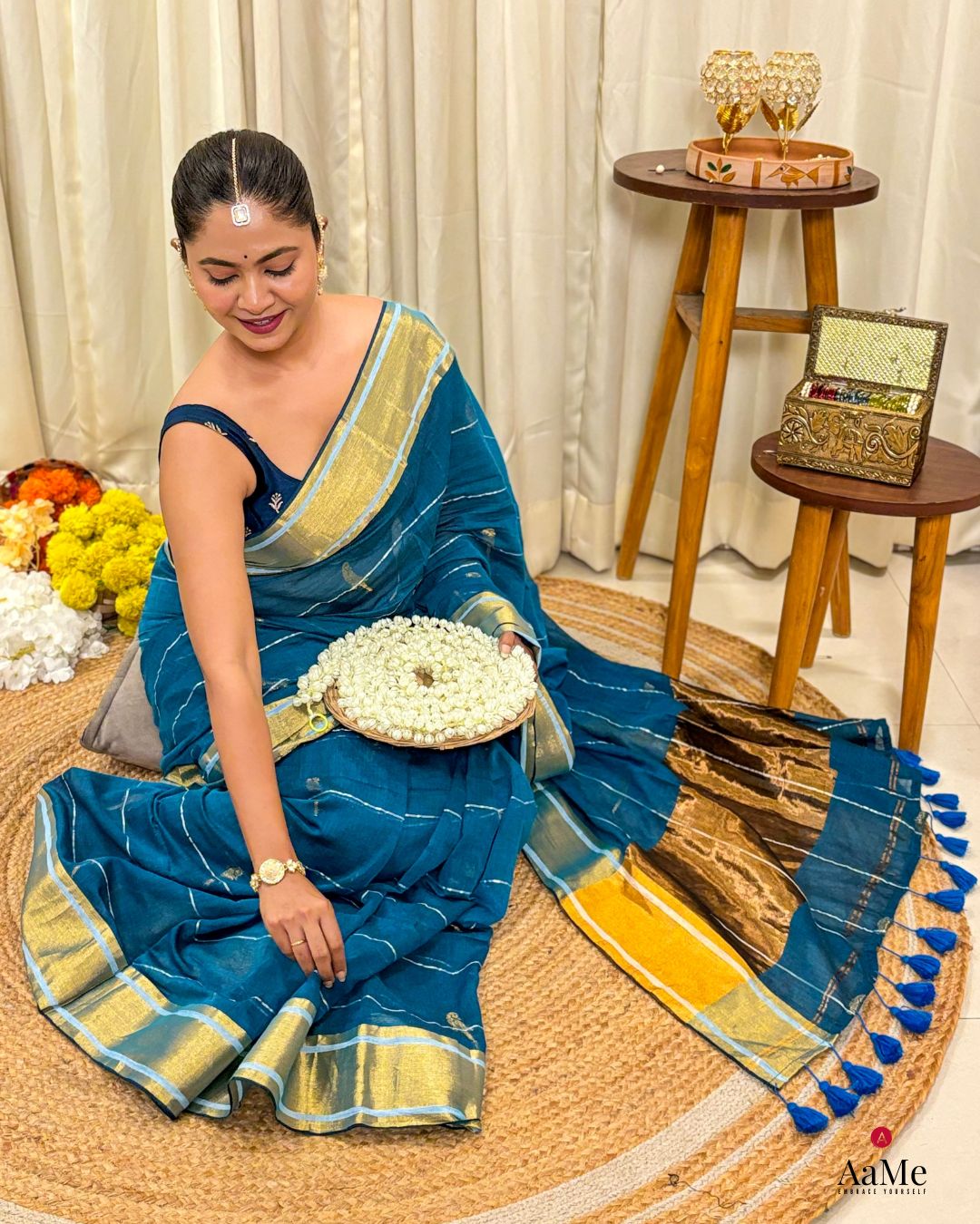 Women wearing soft blue mulmul saree in breathable cotton, ideal for elegant celebrations and comfort wear