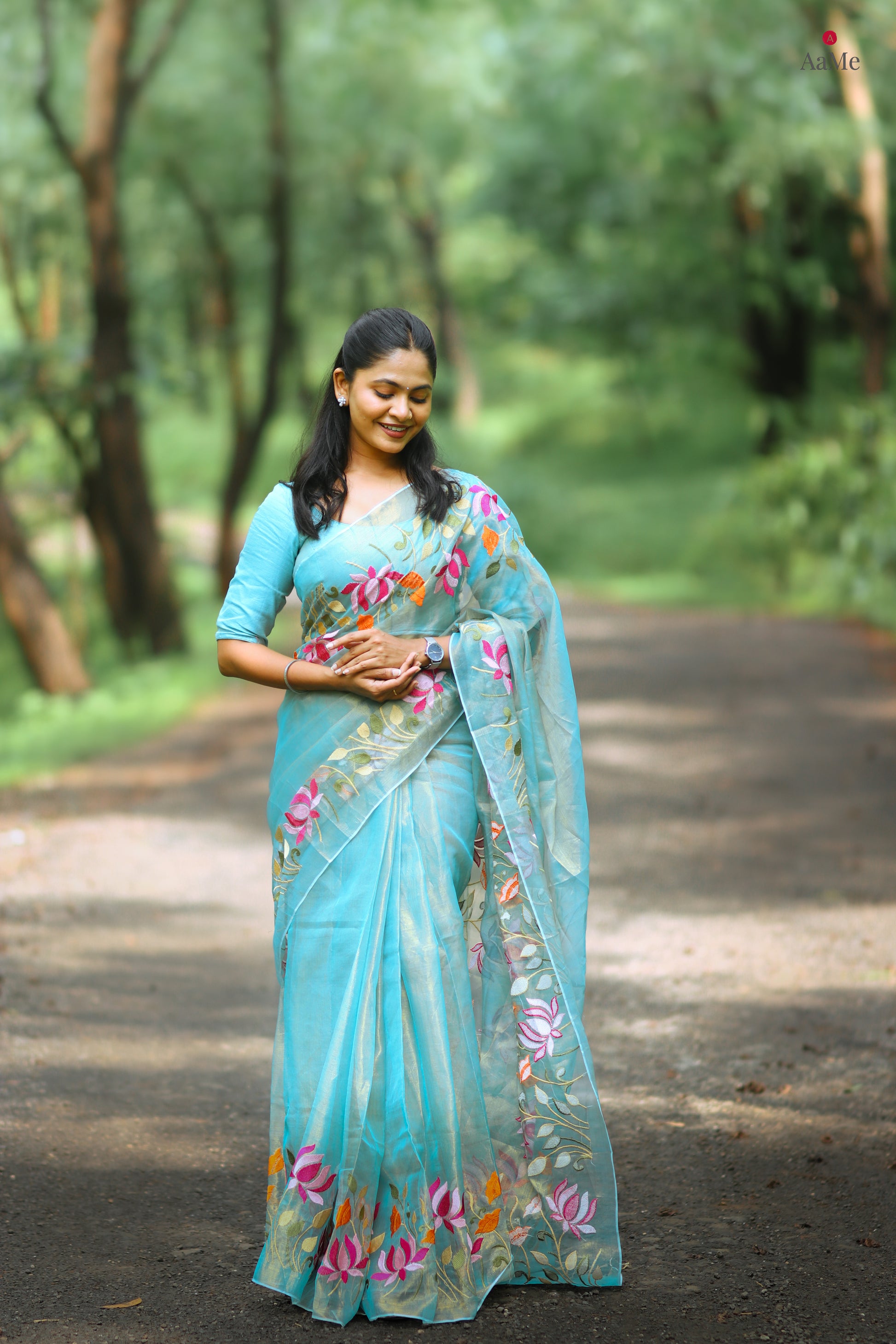 Blue viral  tissue saree with floral embroidery orange and pink