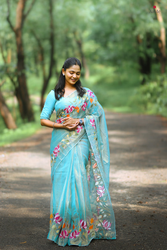 Blue viral  tissue saree with floral embroidery orange and pink