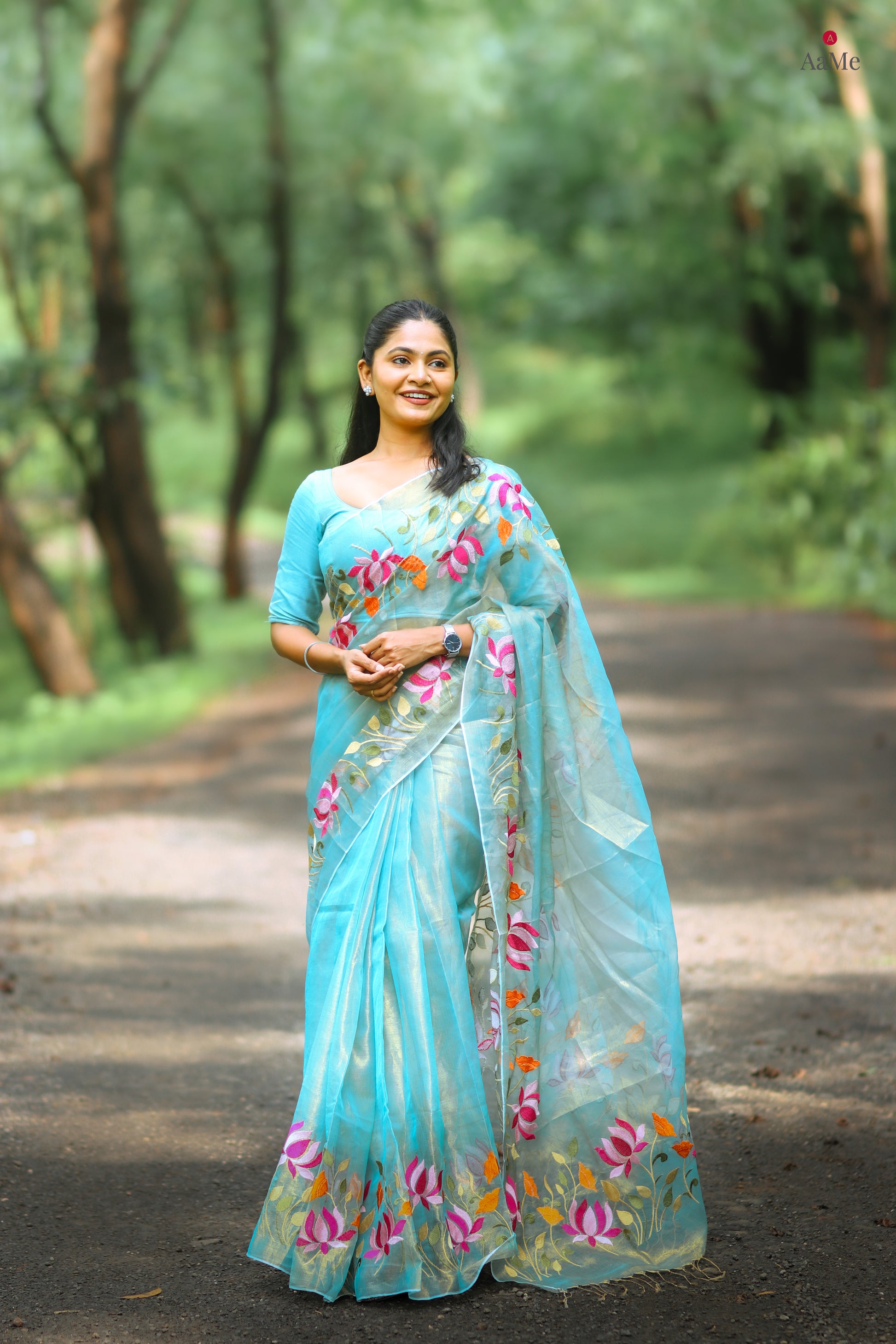 Blue viral  tissue saree with floral embroidery orange and pink