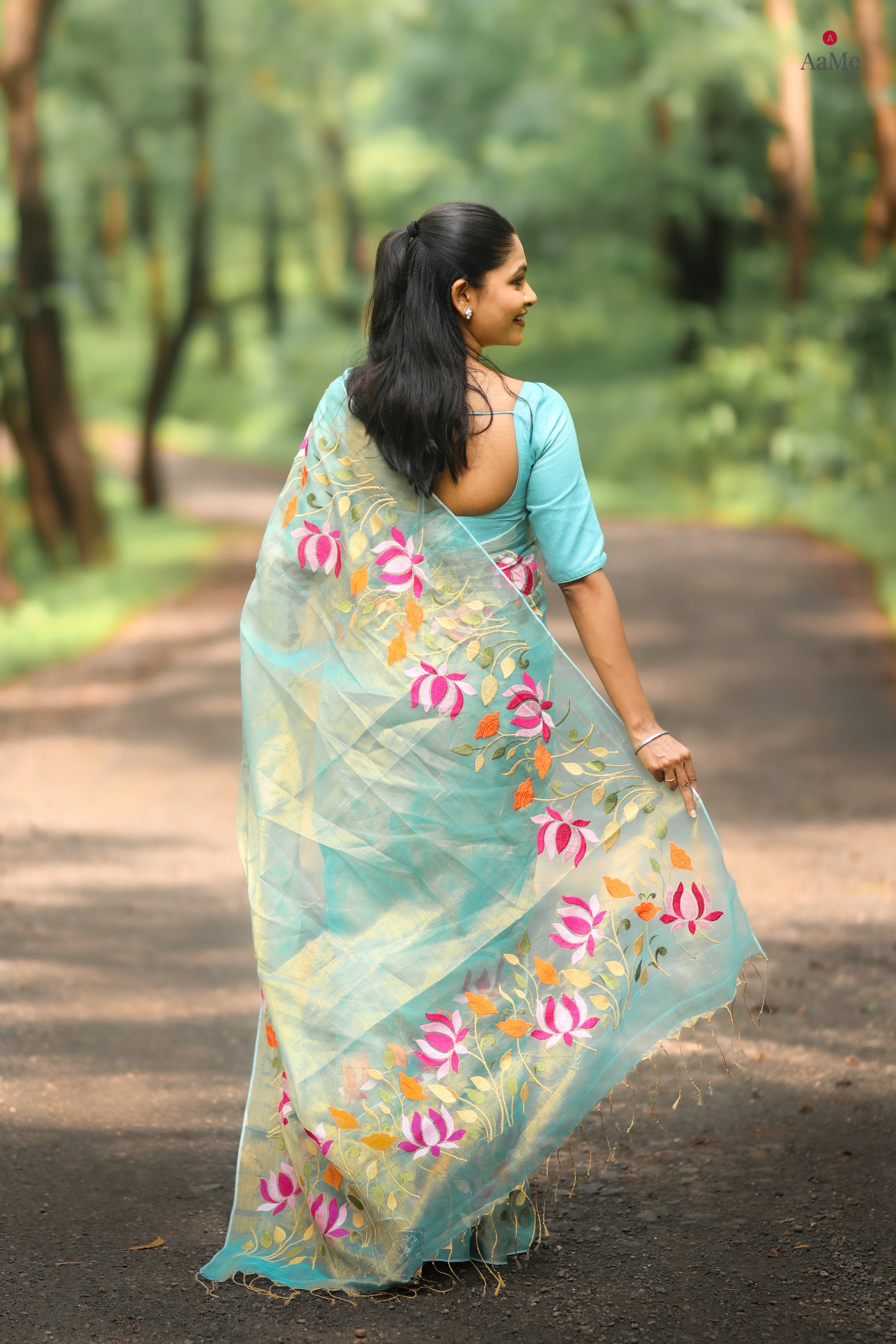 Blue viral  tissue saree with floral embroidery orange and pink