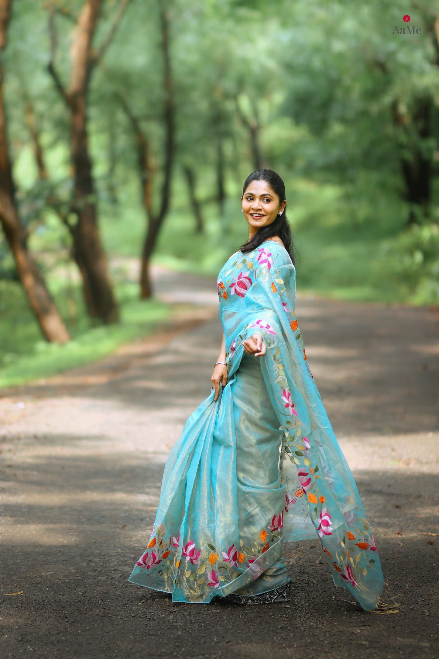 Blue viral  tissue saree with floral embroidery orange and pink