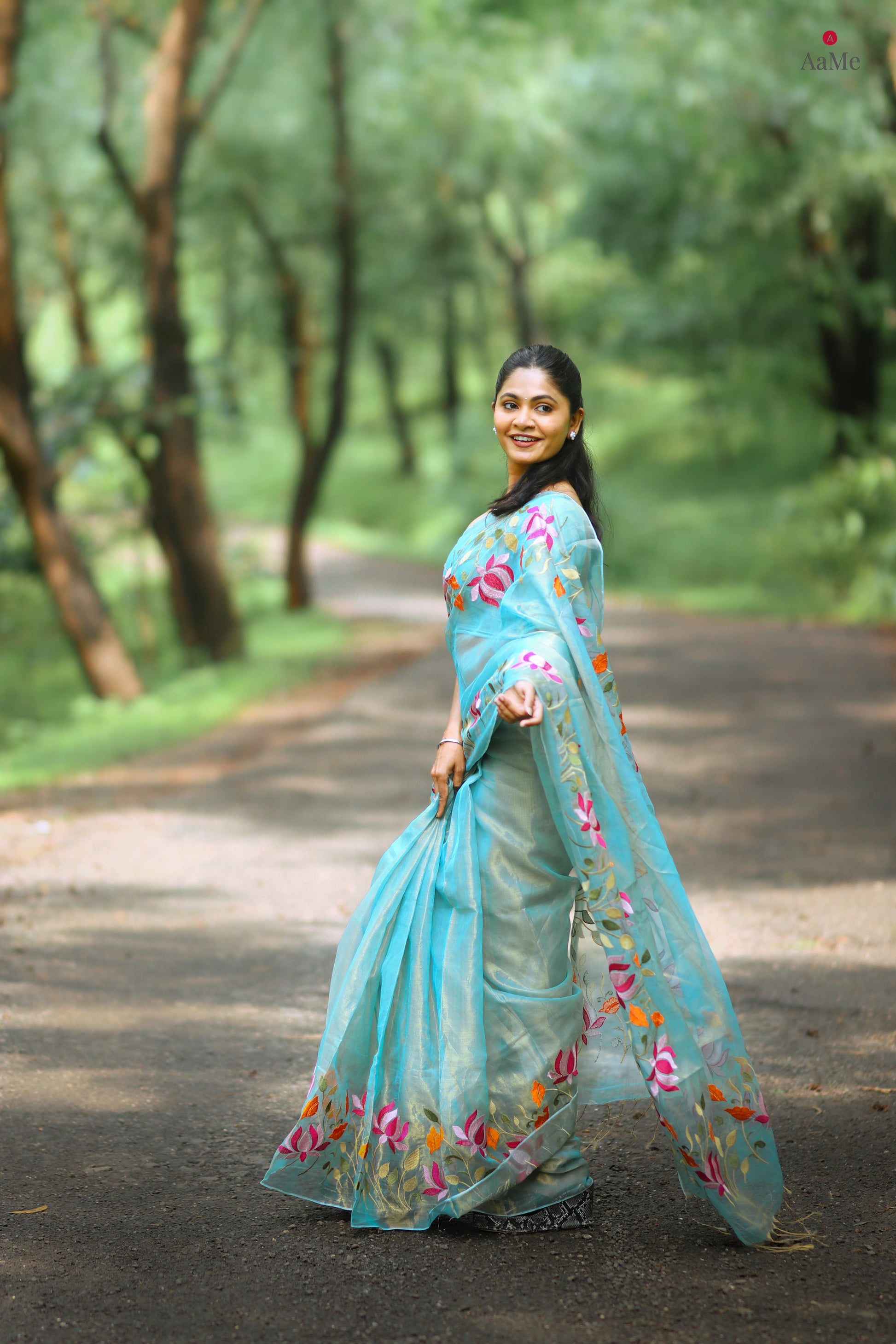 Blue viral  tissue saree with floral embroidery orange and pink