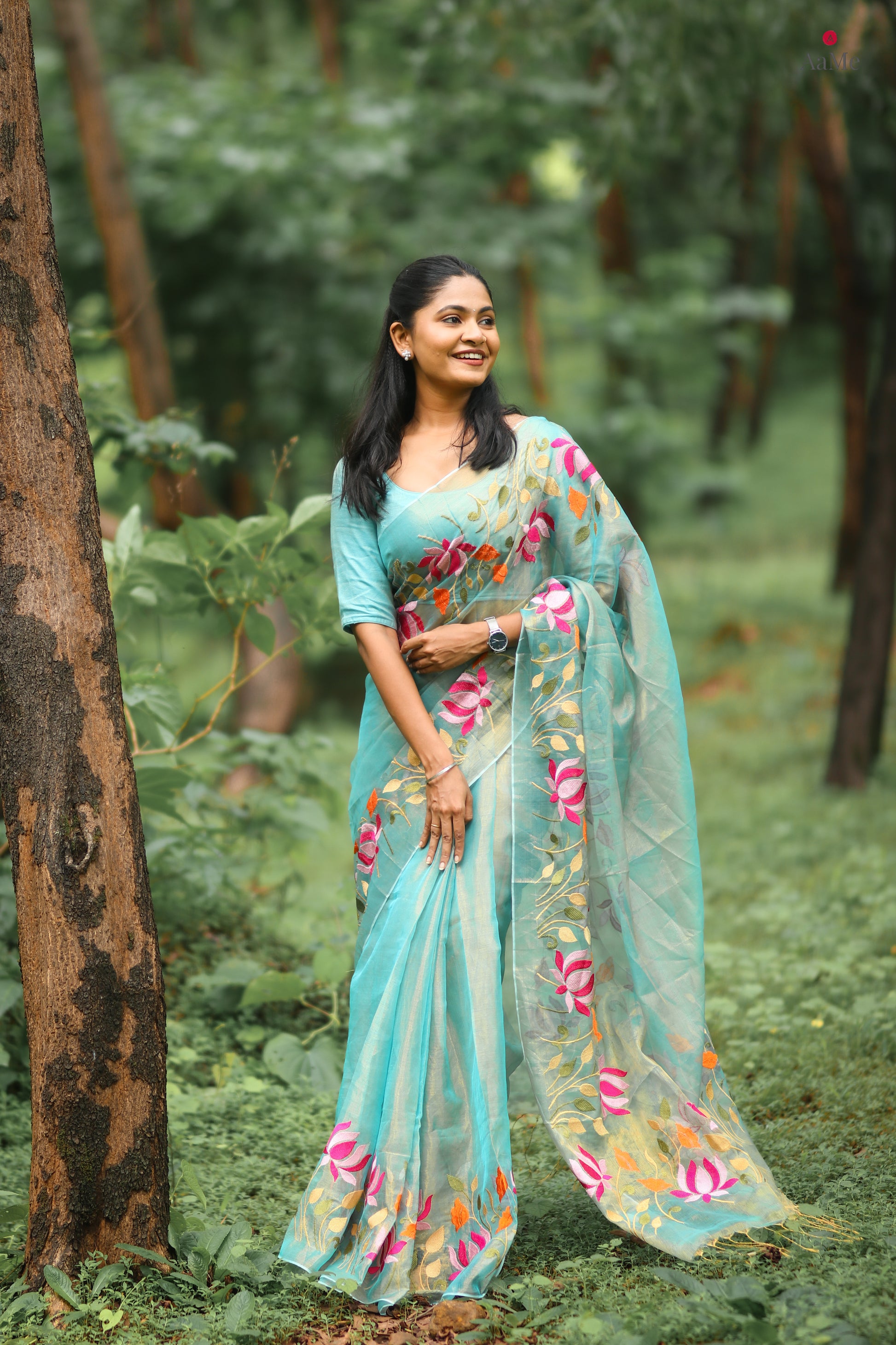 Blue viral  tissue saree with floral embroidery orange and pink