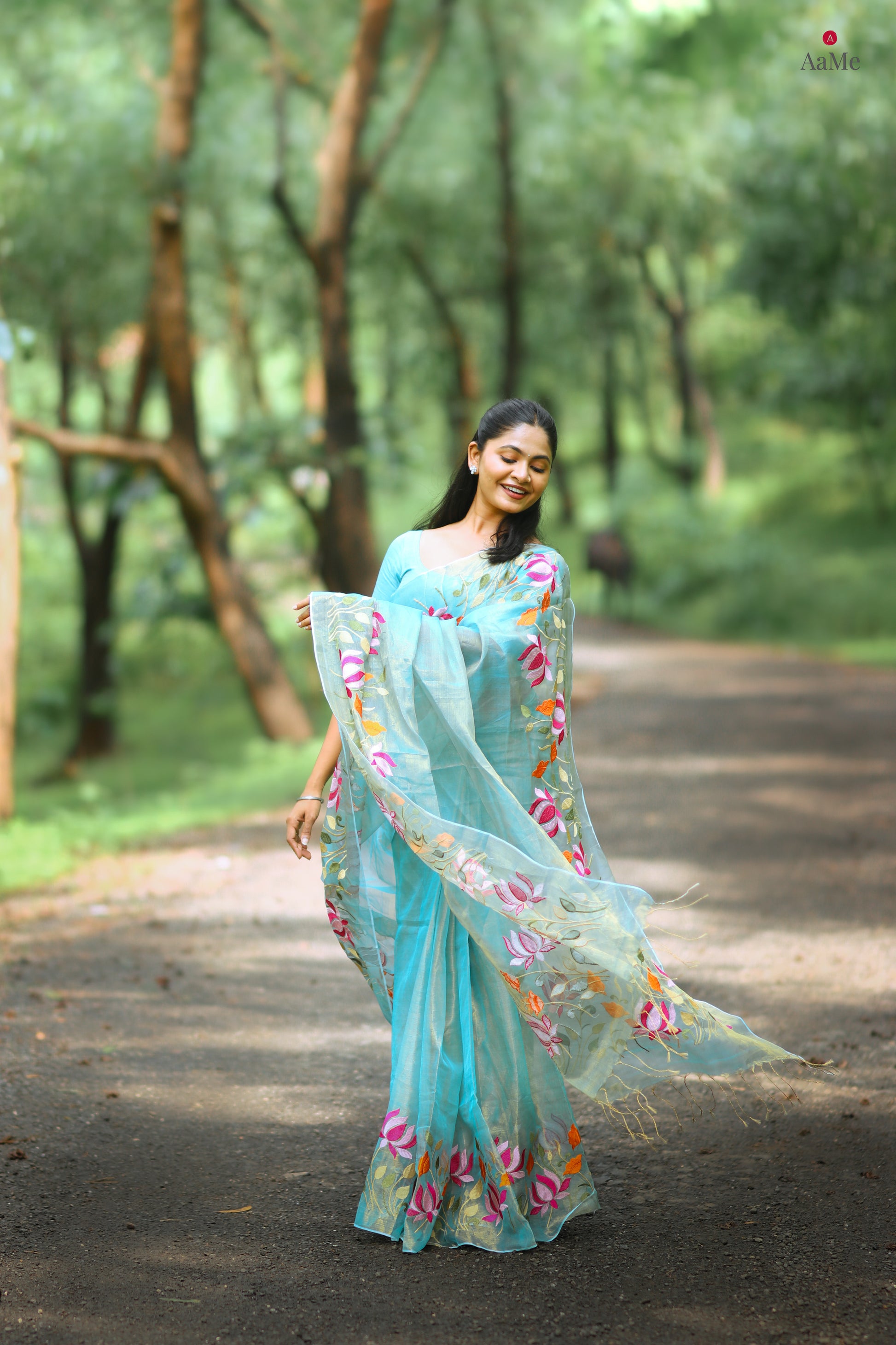 Blue viral  tissue saree with floral embroidery orange and pink
