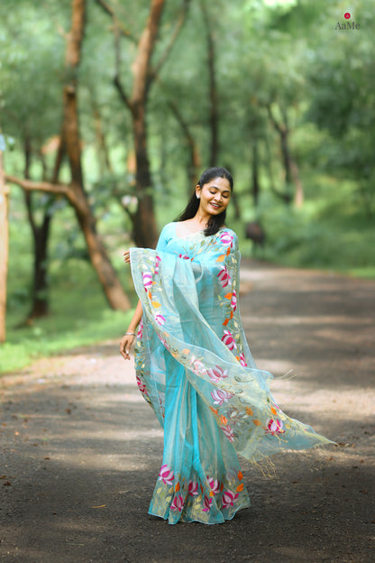 Blue viral  tissue saree with floral embroidery orange and pink