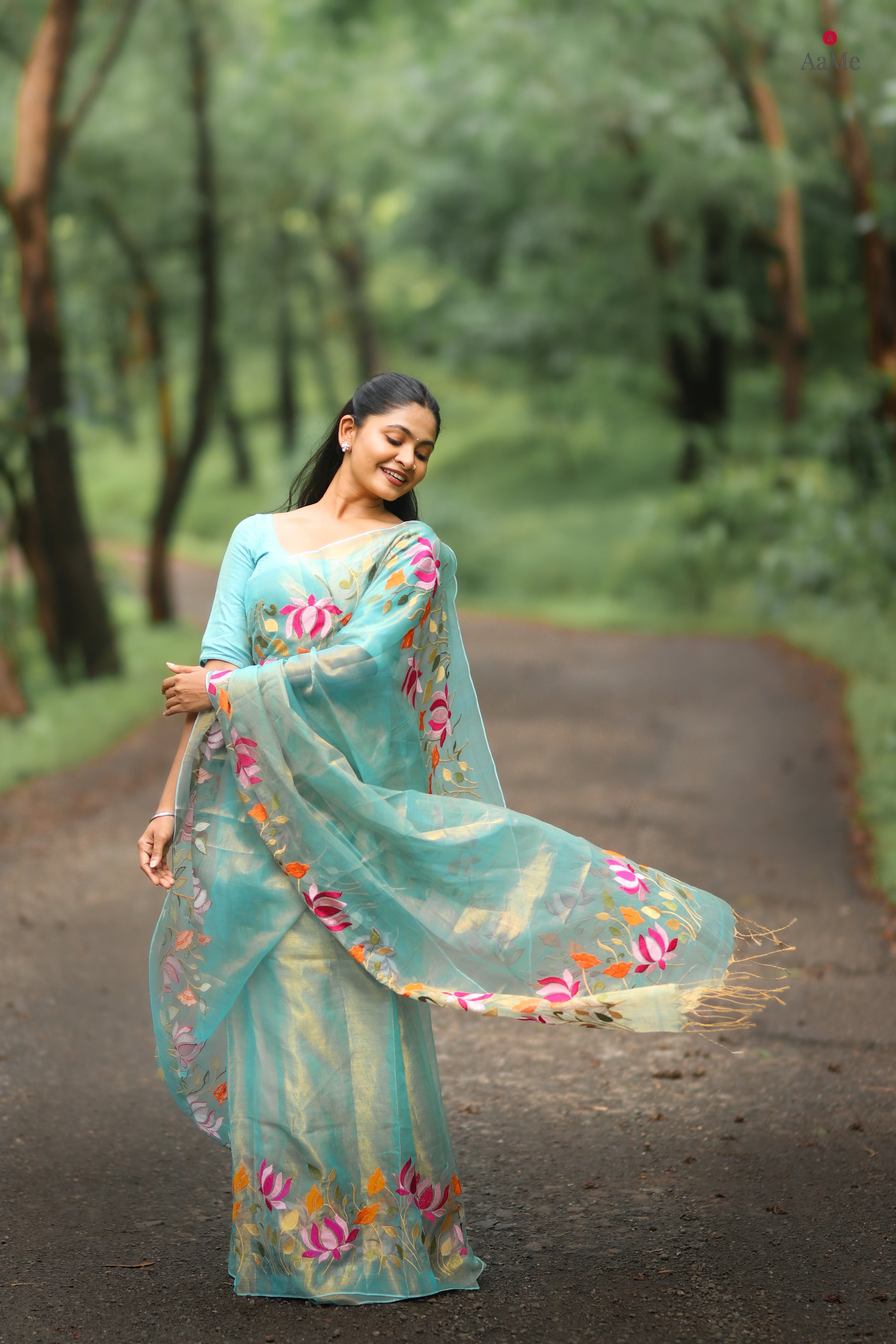 Blue viral  tissue saree with floral embroidery orange and pink