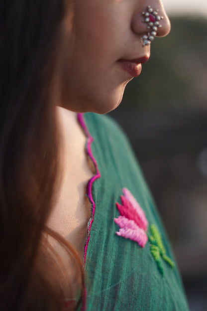 Soft and comfortable embroidered mulmul cotton saree in green for day festivities or casual outing