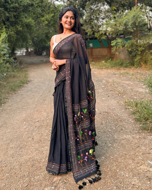 Noir Petal Nocturne black embroidered mulmul saree with elegant handcrafted detailing