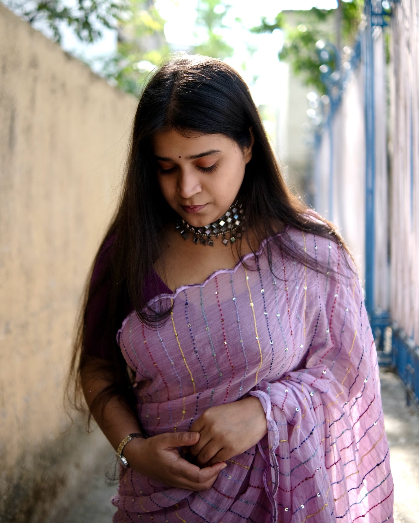 Soft and comfortable mulmul cotton saree with multicoloured embroidery in Kantha Stitch embellished with sequins perfect for party or festive occasion  in purple or violet or mauve or lavender