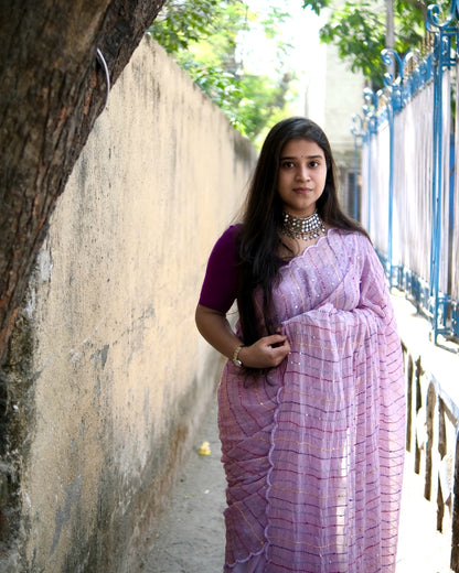 Soft and comfortable mulmul cotton saree with multicoloured embroidery in Kantha Stitch embellished with sequins perfect for party or festive occasion  in purple or violet or mauve or lavender