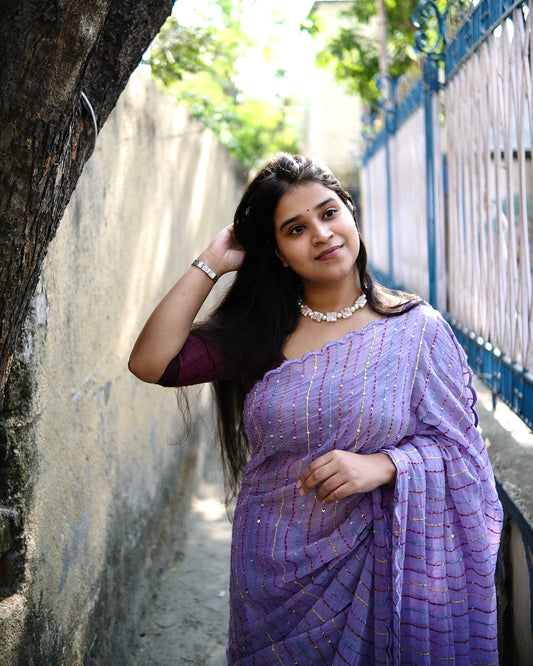 Soft and comfortable mulmul cotton saree with multicoloured embroidery in Kantha Stitch embellished with sequins perfect for party or festive occasion  in purple or violet or mauve or lavender