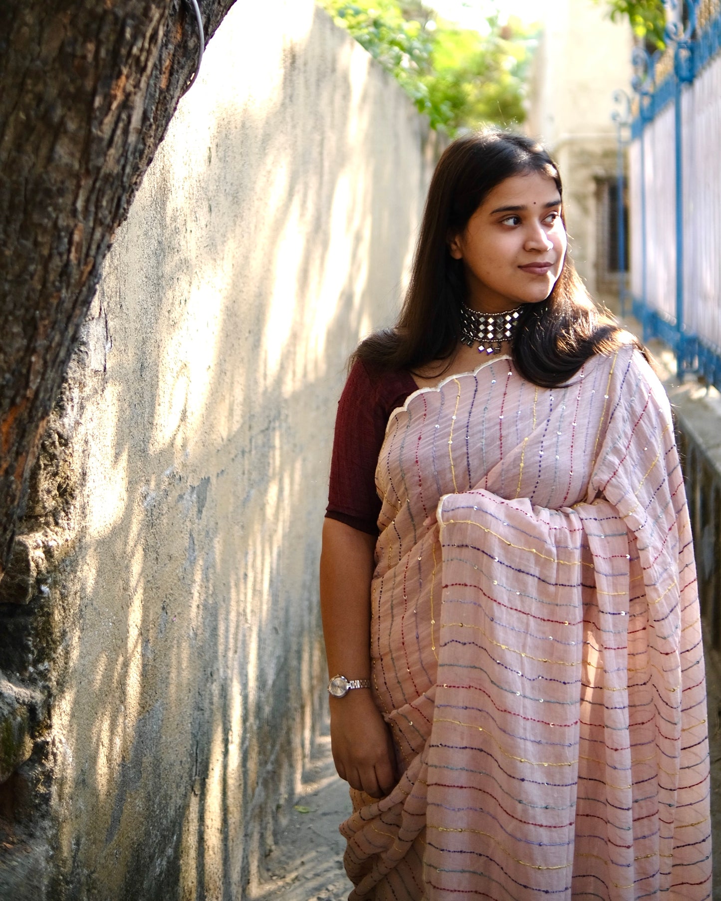 Soft and comfortable mulmul cotton saree with multicoloured embroidery in Kantha Stitch embellished with sequins perfect for party or festive occasion  in peach or beige or cream