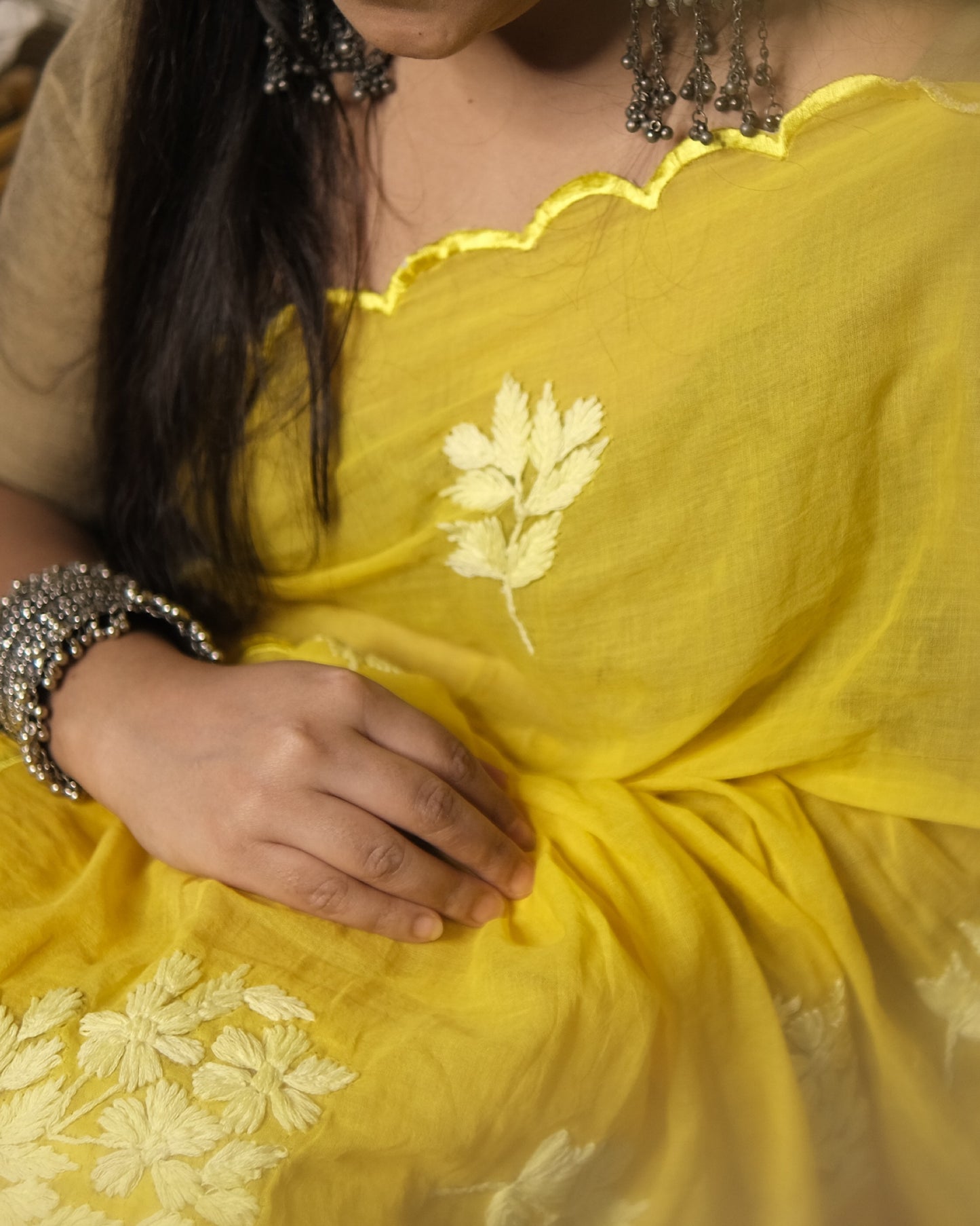 Soft and Comfortable mulmul cotton saree with Chikankari machine work and cutwork border in self tones of yellow