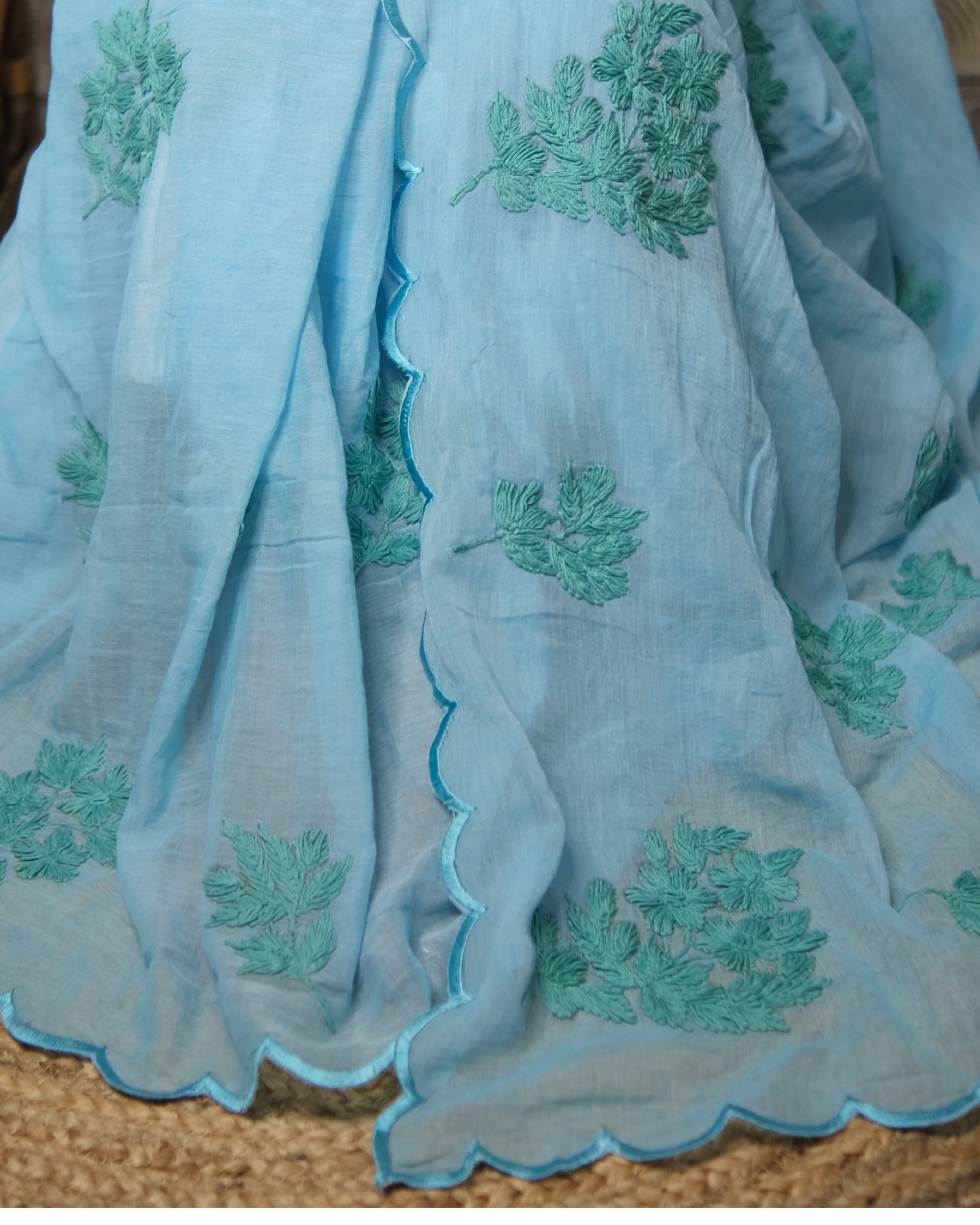 Soft and Comfortable mulmul cotton saree with Chikankari machine work and cutwork border in self tones of sky blue