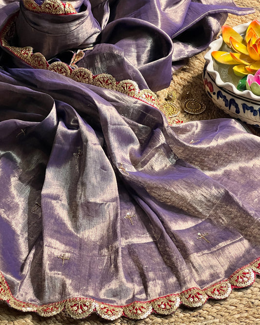 Mulmul Tissue Festive/Party Wear saree for the wedding season in  lavender / purple / violet  colour  with red Sari border and Zardozi/Jarsousi  work on entire saree, metallic finish