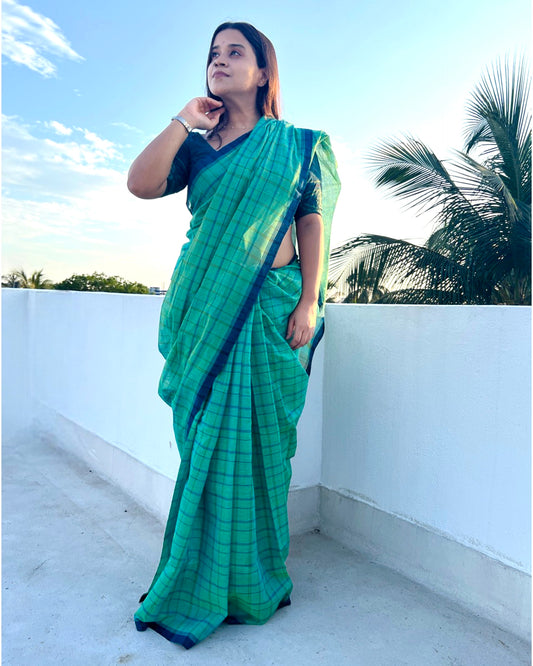 Soft and comfortable cotton handloom saree in Green and blue with Dhaniakhali Aanchal and checks