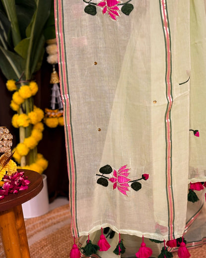 Soft and comfortable embroidered mulmul cotton saree in green for day festivities or casual outing