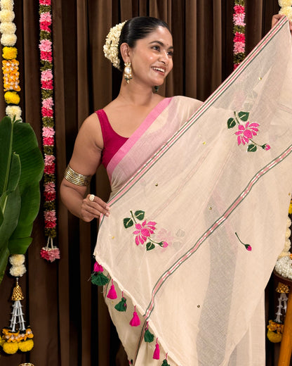 Soft and comfortable embroidered mulmul cotton saree in white for day festivities or casual outing